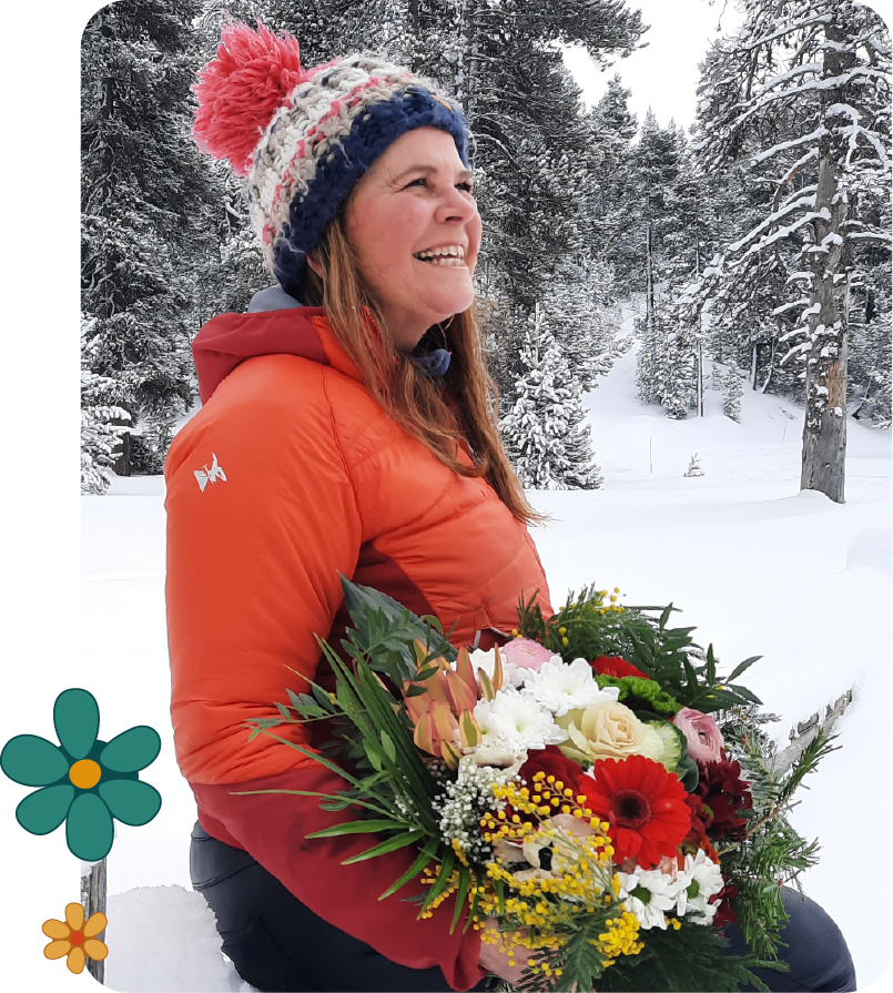 Portrait de la P'tite Jardinière Sandrine Bial, patronne d'Au P'tit Jardin, jardinerie et fleuriste à Briançon.